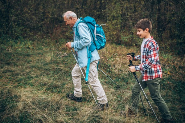 Father hiking with son